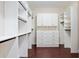 Large walk-in closet with ample shelving and drawers at 995 Sw 37Th Place Rd, Ocala, FL 34471