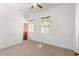 Bright bedroom with neutral walls and carpet flooring at 10320 Sw 103Rd Ct, Ocala, FL 34481