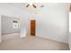 Bedroom with mirrored closet and carpet at 10320 Sw 103Rd Ct, Ocala, FL 34481