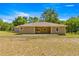 House exterior with covered patio at 10320 Sw 103Rd Ct, Ocala, FL 34481