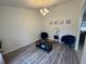 Dining room features hardwood floors and a chandelier at 1060 Sw Big Tree Rd, Dunnellon, FL 34431