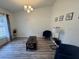 Dining area with hardwood floors, a table and chairs at 1060 Sw Big Tree Rd, Dunnellon, FL 34431