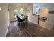 Dining area with hardwood floors and view of living room at 1060 Sw Big Tree Rd, Dunnellon, FL 34431