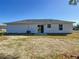 Rear view of a single-story house with vinyl siding at 10856 Sw 79Th Ave, Ocala, FL 34476