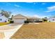 Single-story home with attached garage and landscaped yard at 11518 Sw 136Th Pl, Dunnellon, FL 34432