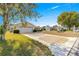 Two-car garage and a brick paved driveway at 11518 Sw 136Th Pl, Dunnellon, FL 34432