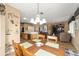 Open concept dining area with a view into the living room at 12531 Se 90Th Ter, Summerfield, FL 34491