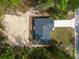 Overhead view of a house on a lot with sandy areas at 1280 Nw Redwood Dr, Dunnellon, FL 34431