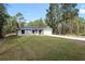 Single-story house with attached garage at 1280 Nw Redwood Dr, Dunnellon, FL 34431