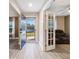 View of living room from entryway, featuring light wood floors at 13198 Sw 29Th Cir, Ocala, FL 34473