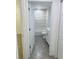 Bathroom features white tile walls, a shower and tub combination and herringbone floors at 13253 Se 35Th Ct, Belleview, FL 34420