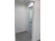 Hallway offers seamless flow to various rooms with stylish tile floors at 13253 Se 35Th Ct, Belleview, FL 34420