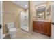 Bathroom with shower, vanity, and toilet at 16867 Sw 40Th Cir, Ocala, FL 34473