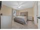 Bedroom with plush bed, dresser, and carpet at 16867 Sw 40Th Cir, Ocala, FL 34473