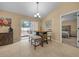 Dining area with sliding doors leading to backyard deck at 16867 Sw 40Th Cir, Ocala, FL 34473