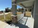 Inviting front porch with stone columns and white railing at 25 Nw 113Th Cir, Ocala, FL 34482