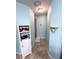 Light teal bathroom with shower and built-in shelving at 3 Maple Run, Ocala, FL 34472