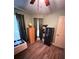 Bedroom featuring wood flooring, a dresser, and a safe at 3 Maple Run, Ocala, FL 34472