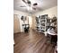 Bedroom with built-in shelving and ceiling fan at 3 Maple Run, Ocala, FL 34472