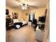 Cozy bedroom with a bed, desk, and ceiling fan at 3 Maple Run, Ocala, FL 34472