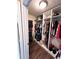 Walk-in closet with ample hanging and shelving space at 3 Maple Run, Ocala, FL 34472