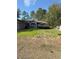 House with a yard and a lamp post at 3 Maple Run, Ocala, FL 34472