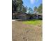 Single story home with attached garage, landscaping, and a walkway at 3 Maple Run, Ocala, FL 34472