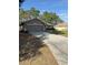 Front view of a house with a driveway and garage at 3 Maple Run, Ocala, FL 34472