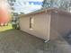 Side view of house with window and yard at 3 Maple Run, Ocala, FL 34472