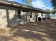 Side view of a house with windows and gutters at 3 Maple Run, Ocala, FL 34472