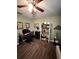 Home office with wood floors, desk and shelving at 3 Maple Run, Ocala, FL 34472