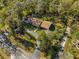 Aerial view of house, driveway, and landscaping at 3650 Se 22Nd Ave, Ocala, FL 34471