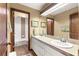 Bright bathroom with double vanity, tub, and shower at 3650 Se 22Nd Ave, Ocala, FL 34471