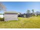 View of the backyard with shed and pool at 3660 Se 54Th Ave, Ocala, FL 34480