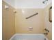 Clean bathroom with shower/tub combo and grab bars at 3766 Sw 147Th Lane Rd, Ocala, FL 34473