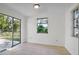 Cozy dining area with sliding glass doors leading to the backyard at 3766 Sw 147Th Lane Rd, Ocala, FL 34473