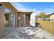 Rear view of a house with sliding doors and storage shed at 3766 Sw 147Th Lane Rd, Ocala, FL 34473