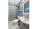 Clean bathroom with shower/tub combo and vanity at 3805 Se 138Th Pl, Summerfield, FL 34491