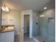 Bathroom with double vanity, large shower, and separate toilet area at 5110 Sw 92Nd St, Ocala, FL 34476