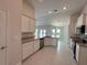 Spacious kitchen with an island and stainless steel appliances at 5110 Sw 92Nd St, Ocala, FL 34476