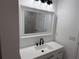 Bathroom features a vanity with a white countertop and black faucet at 5363 Nw 3Rd St, Ocala, FL 34482