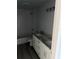 Bathroom with double sinks, gray countertops, white subway tile and modern fixtures at 5411 Nw 7Th Pl, Ocala, FL 34482
