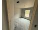 Spacious bedroom with large window and unfinished walls at 5411 Nw 7Th Pl, Ocala, FL 34482