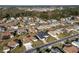 Neighborhood view showing various houses and landscape at 5503 Nw 25Th Loop, Ocala, FL 34482