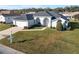 Aerial view of single-story house with a large yard at 5503 Nw 25Th Loop, Ocala, FL 34482