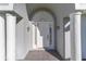 Inviting house entrance with columns and a white door at 5503 Nw 25Th Loop, Ocala, FL 34482