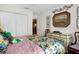 Guest bedroom with ample closet space and antique dresser at 5824 Sw 100Th Ln, Ocala, FL 34476