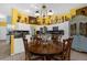 Kitchen dining area with charming wooden table and chairs at 5824 Sw 100Th Ln, Ocala, FL 34476