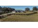 Ranch home with large yard and wooden fence at 630 Sw 210Th Ave, Dunnellon, FL 34431