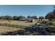 Home's backyard with shed and wooden fence at 630 Sw 210Th Ave, Dunnellon, FL 34431